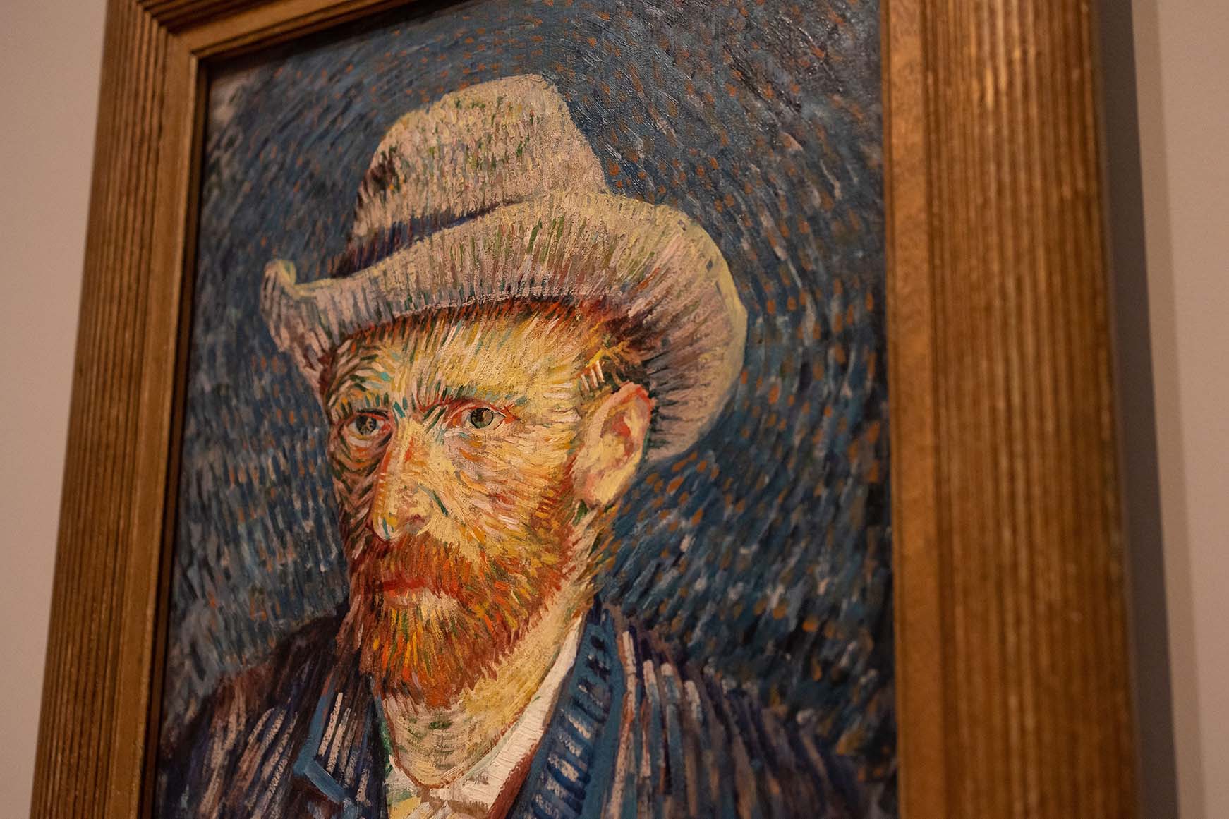 Self-portrait of Vincent van Gogh wearing gray hat