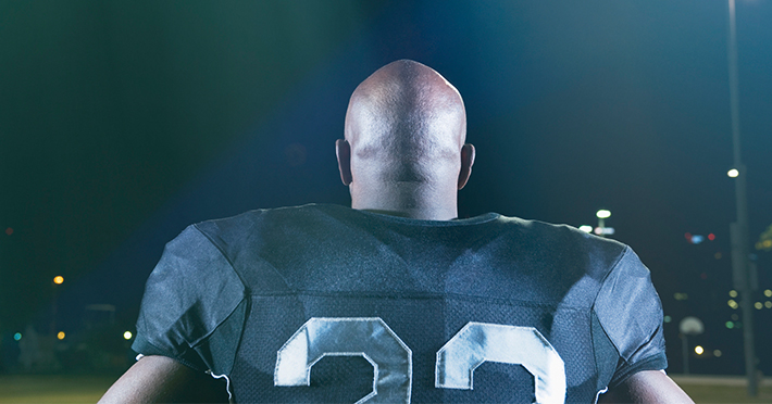 Football player from behind